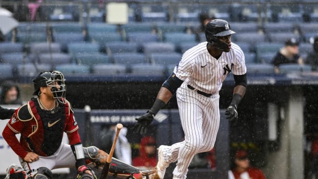 Sep 24, 2023; Bronx, New York, USA; New York Yankees right fielder Estevan Florial (90) hits a triple against the Arizona Diamondbacks during the fifth inning at Yankee Stadium.